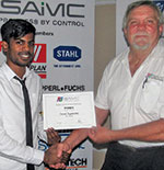 Jared Sigamoney (left) of UKZN, the winner of the Student Award Scheme for the 2nd semester 2018, receiving his certificate from Hennie Prinsloo.